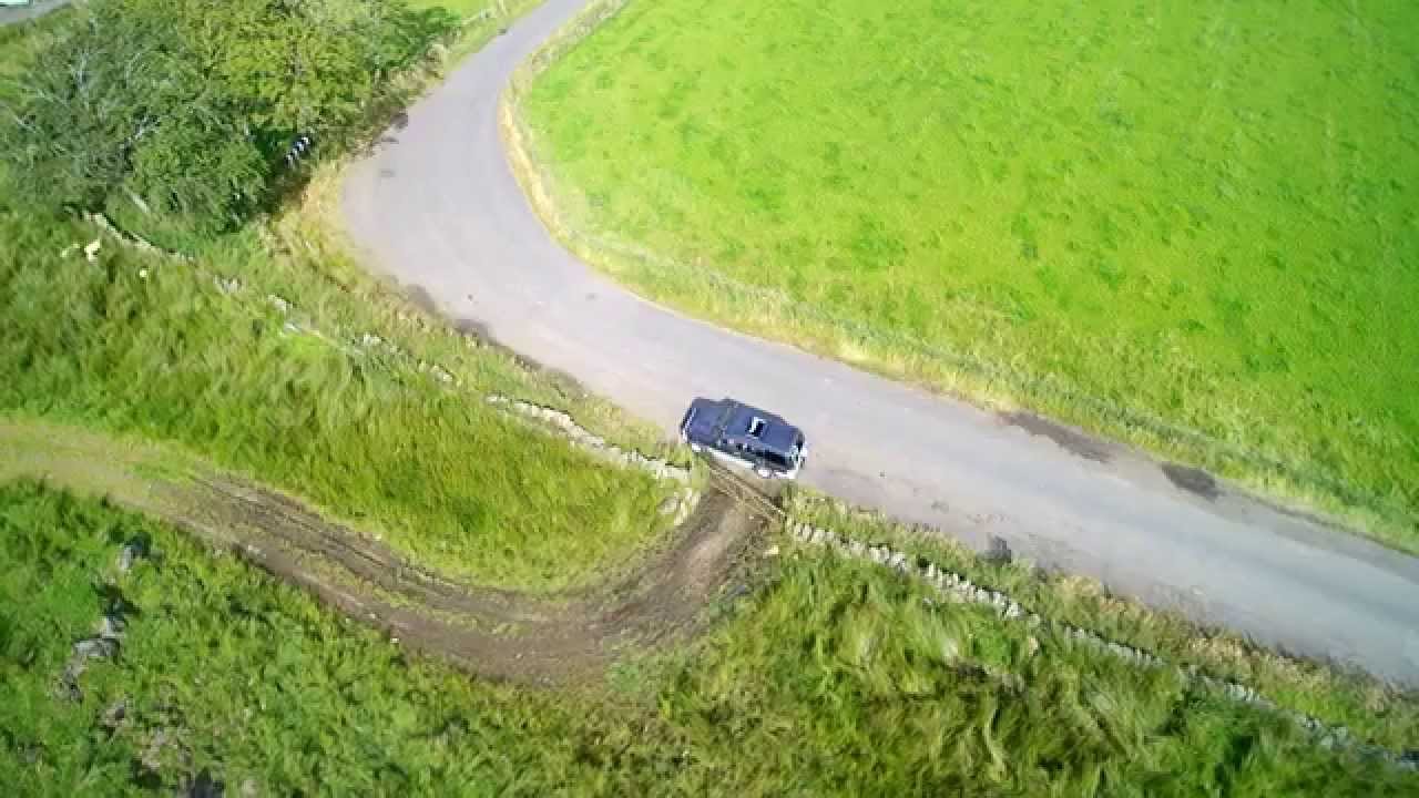 Yuneec Typhoon Q500 4k Quadcopter chasing car in follow me mode.